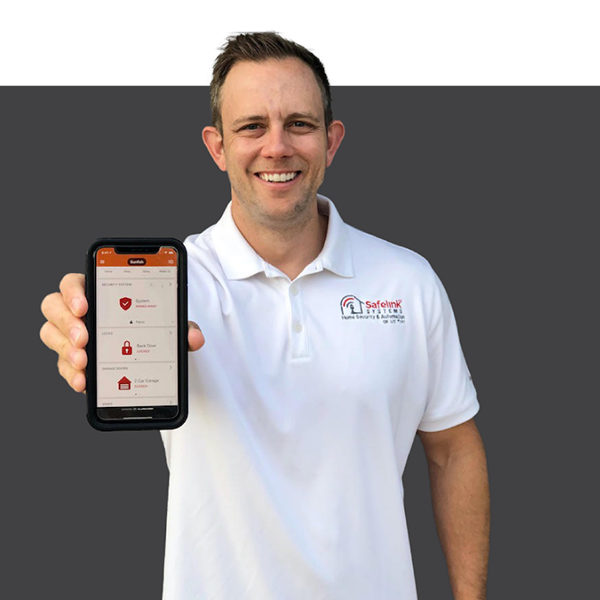 smiling Security alarm systems representative showcasing Safelink app