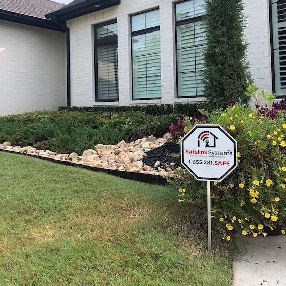 Safelink Security Systems OKC home security system sign in a lawn